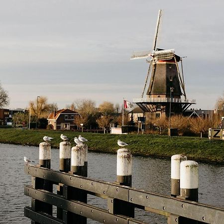 Slapen In De Molen Hotel Arkel Bagian luar foto