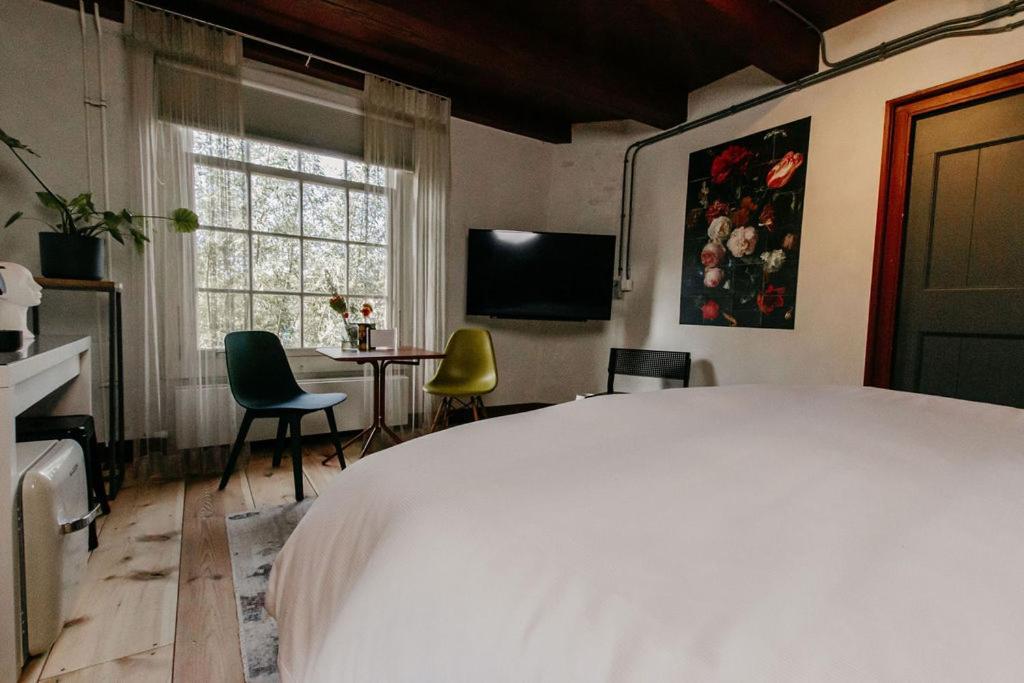Slapen In De Molen Hotel Arkel Bagian luar foto