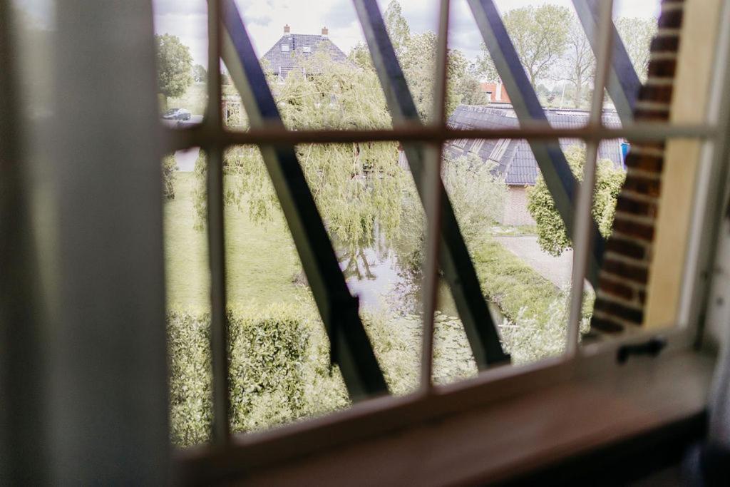 Slapen In De Molen Hotel Arkel Bagian luar foto